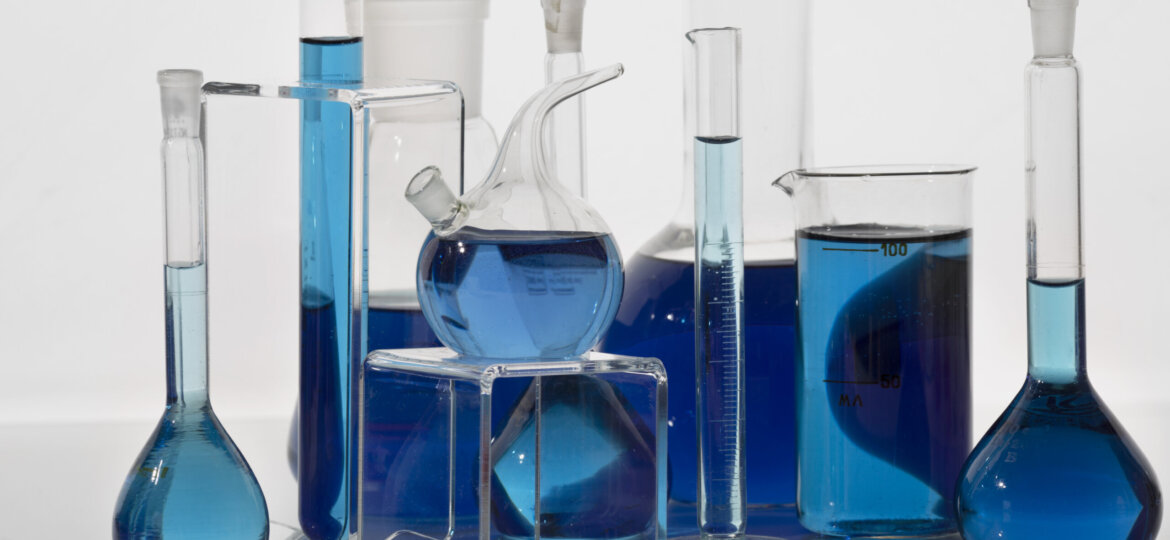 lab-glassware-containing-blue-liquid