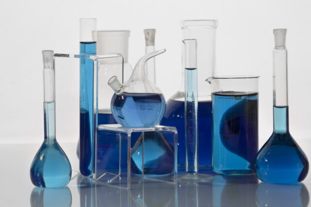 lab-glassware-containing-blue-liquid